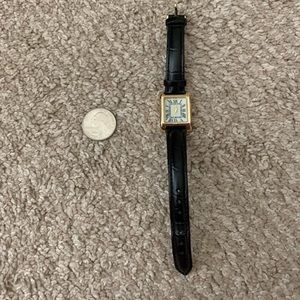 Black Watch with Gold Detailing